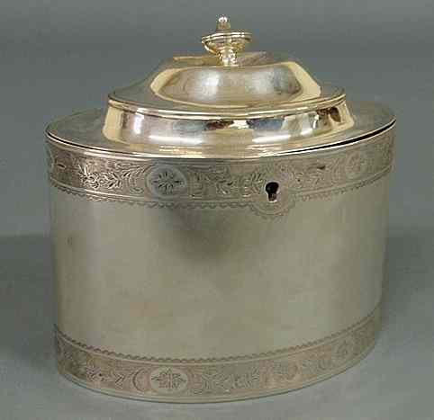 Appraisal: Georgian silver oval tea caddy bearing the maker's mark of