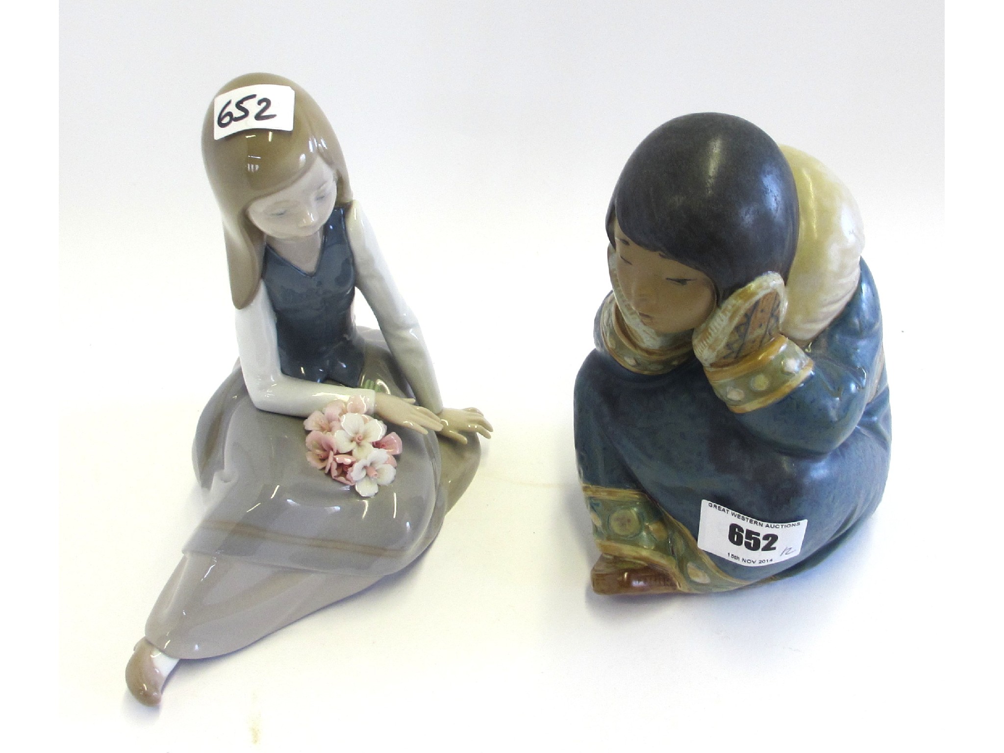 Appraisal: Lladro figure of an Eskimo and another of a seated