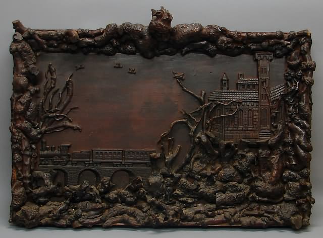 Appraisal: Large carved wood and burl -demensional scene showing building landscape