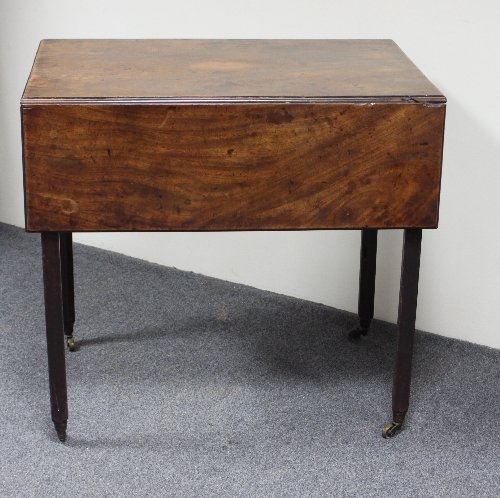 Appraisal: A George III mahogany Pembroke table on square chamfered legs