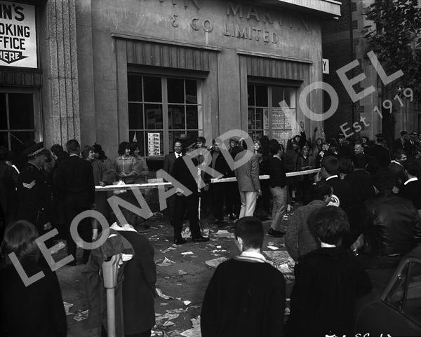 Appraisal: THREE IMAGES OF THE BEATLES' FANS QUEUEING Adelaide June photographer