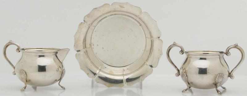 Appraisal: An American Silver Cream Sugar Rogers C Both with compressed