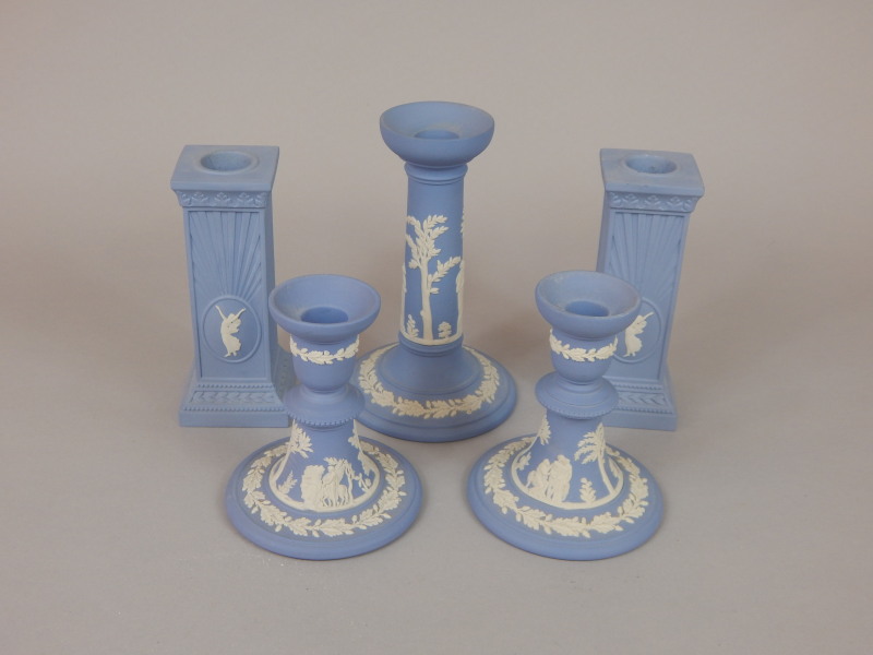 Appraisal: Five blue Wedgwood Jasperware candlesticks each with typical sprig decoration