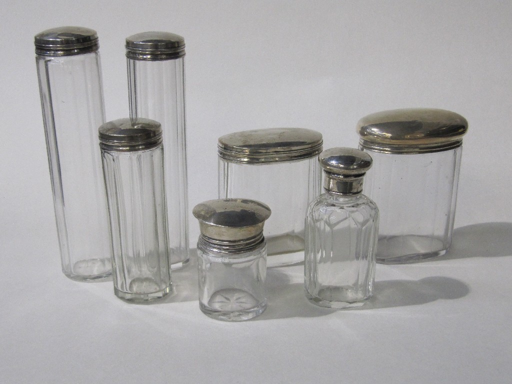 Appraisal: Lot comprising silver topped dressing table jars