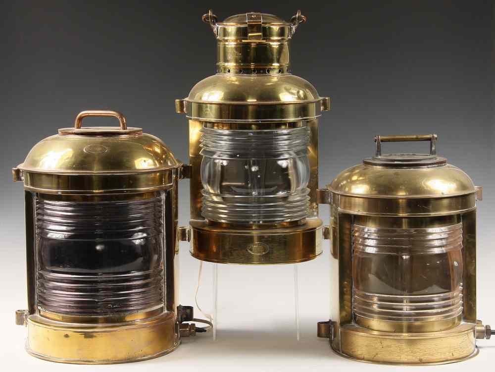 Appraisal: BRASS MASTHEAD LANTERNS - All by Perko with clear Fresnel