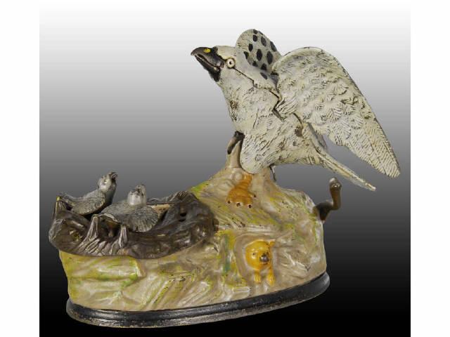 Appraisal: Cast Iron Eagle Eaglets Mechanical Bank Description All original Nice