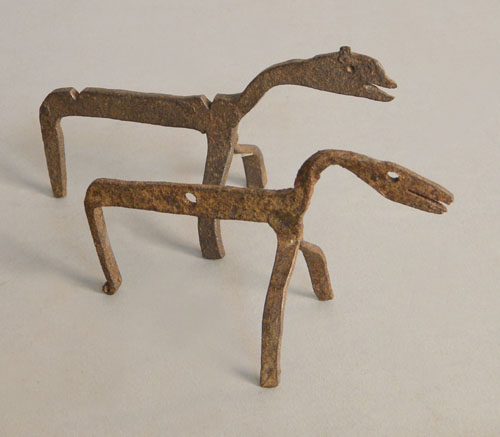 Appraisal: Two miniature iron firedogs l