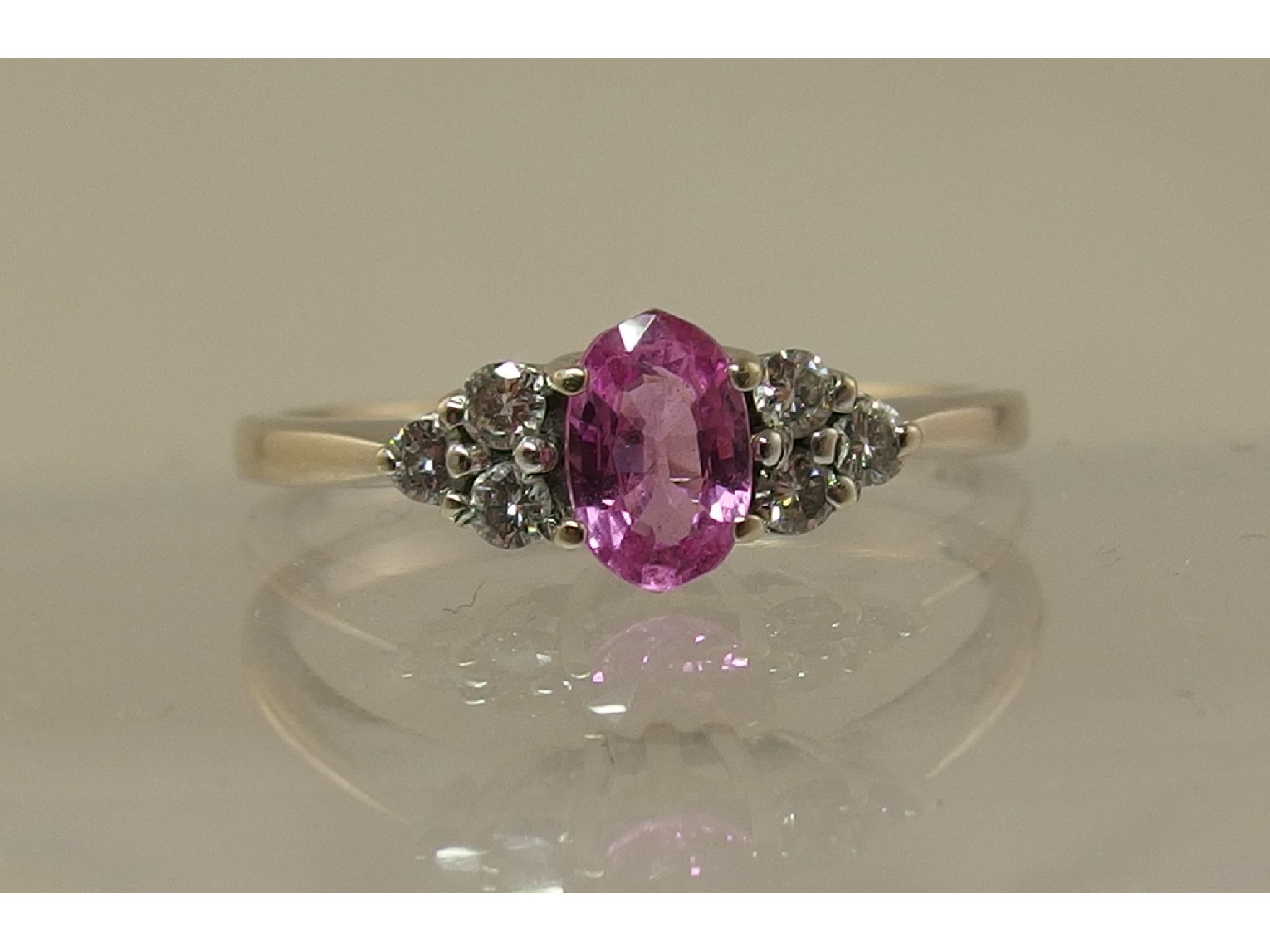 Appraisal: A ct white gold diamond and pink gem stone ring