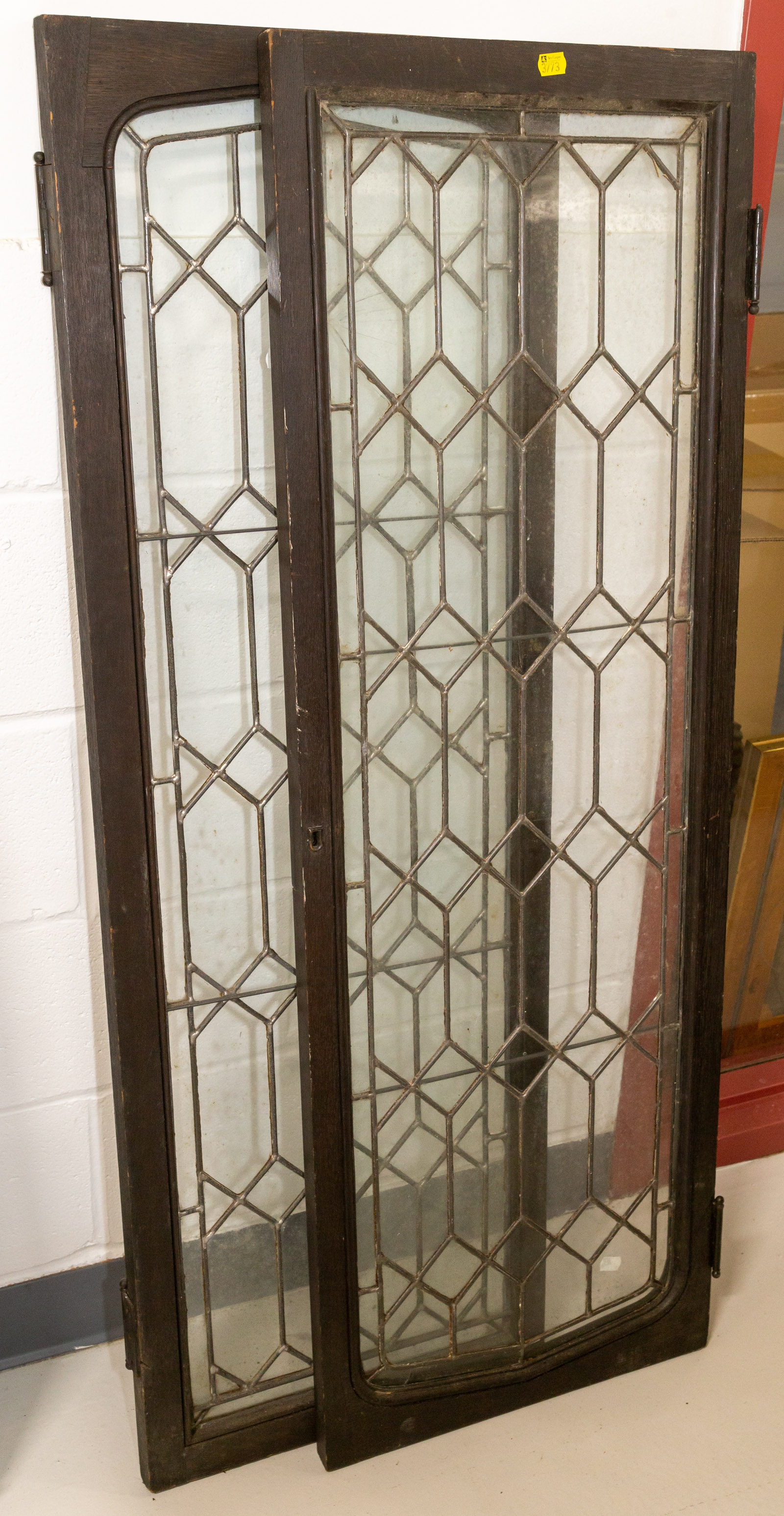 Appraisal: A PAIR OF OAK FRAMED LEADED GLASS CABINET DOORS Early