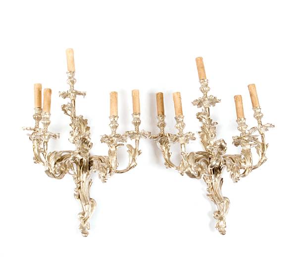 Appraisal: A pair of Louis XV style silvered bronze five light