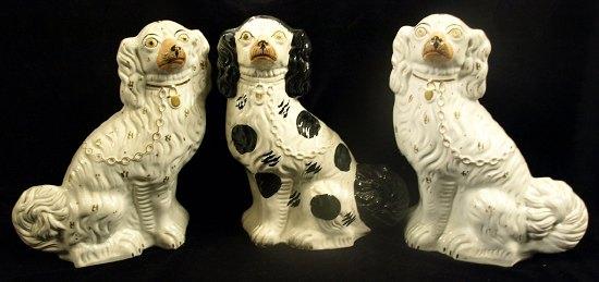 Appraisal: A pair of Staffordshire dogs highlighted in gilt cm high