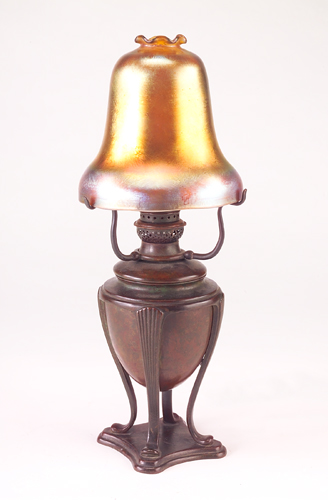 Appraisal: TIFFANY STUDIOS Table lamp with a gold Favrile glass bell-shaped