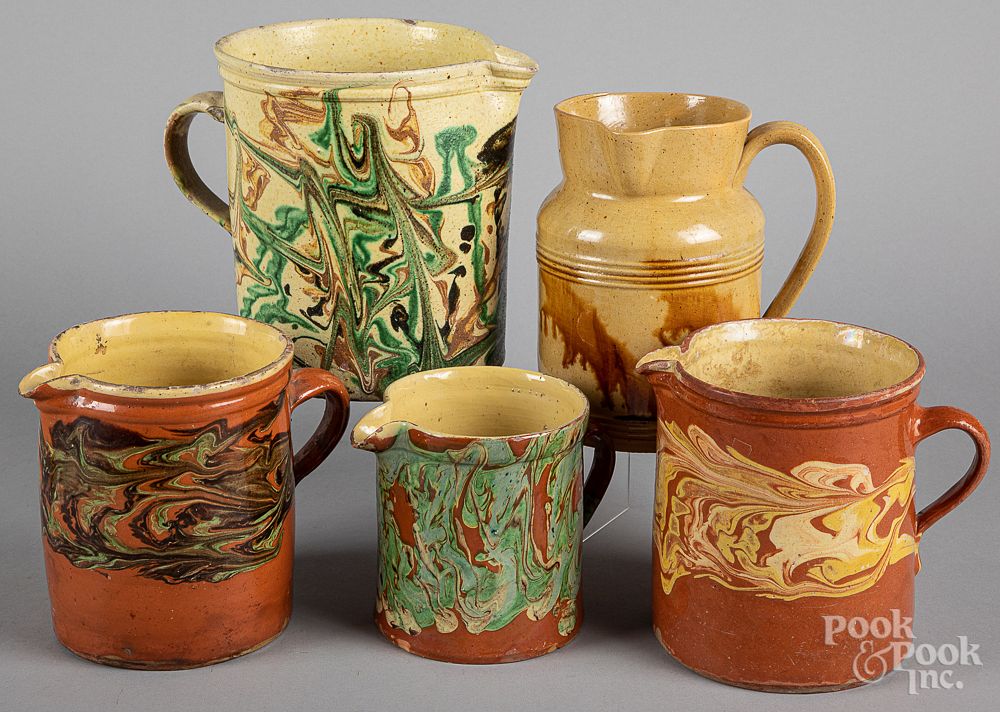 Appraisal: Five French redware pitchers Five French redware pitchers tallest -