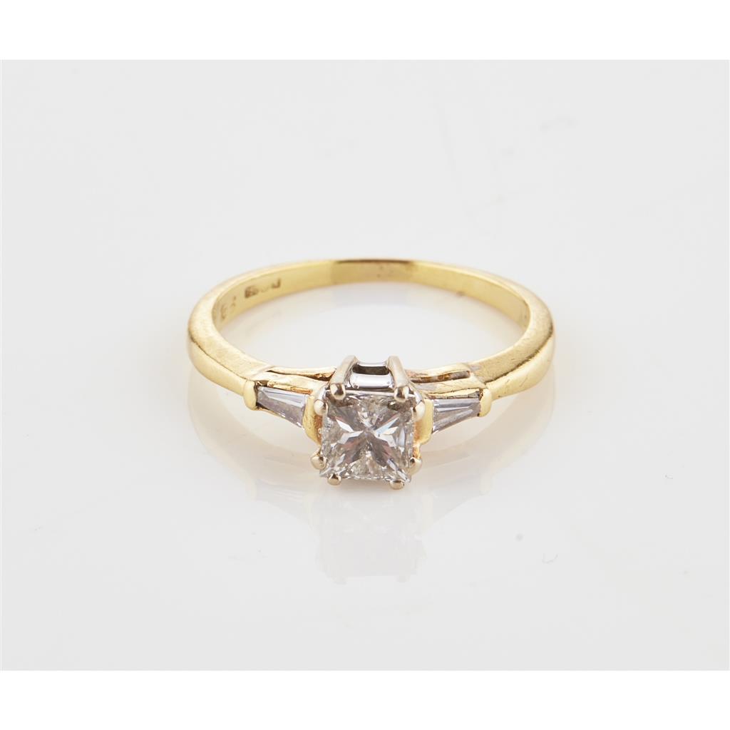 Appraisal: A single stone princess cut diamond ring claw set with