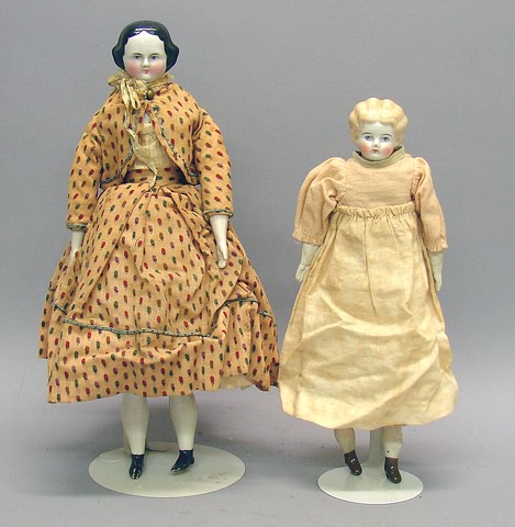 Appraisal: Pair of china dolls Blonde Lowbrow with blue eyes Unglazed