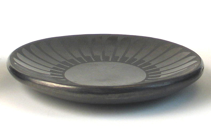 Appraisal: BLACK-ON BLACK SAN ILDEFONSO INDIAN PLATE in the radiating feather