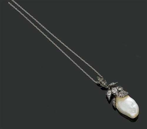 Appraisal: PEARL AND DIAMOND PENDANT WITH CHAIN ca Silver over yellow