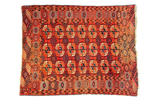 Appraisal: ORIENTAL RUG Late th-early th century Tekke Main Orange field