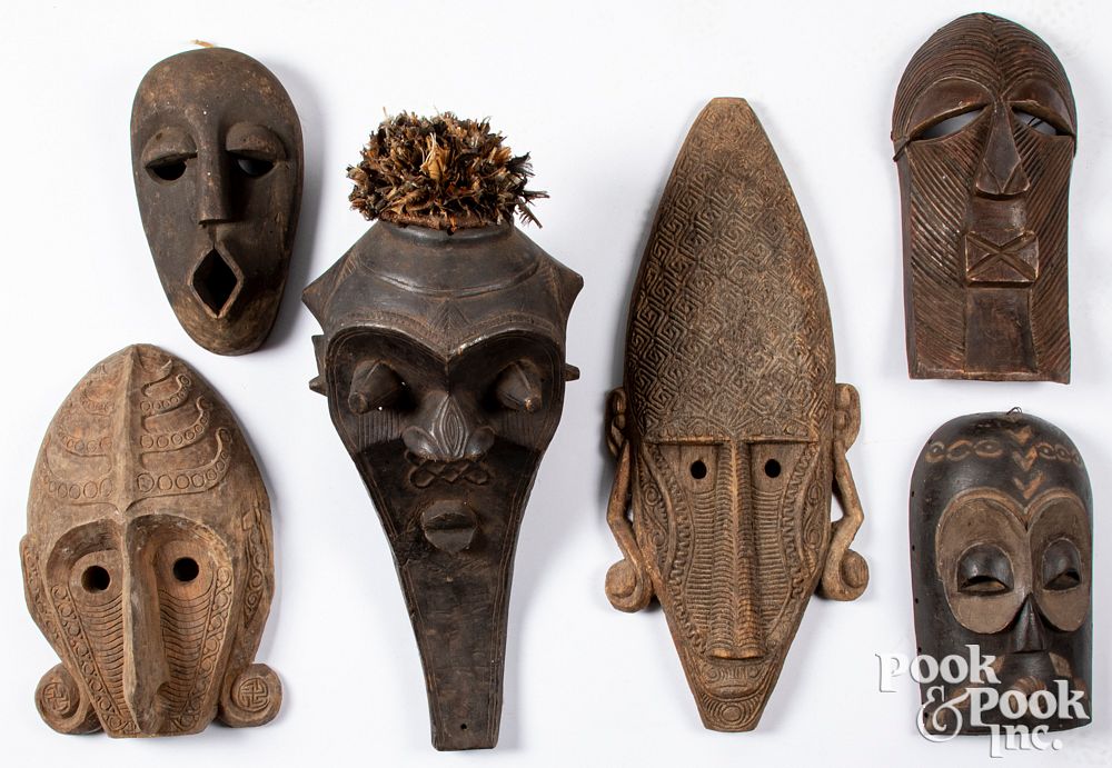 Appraisal: Six wood carved African tribal masks Six wood carved African