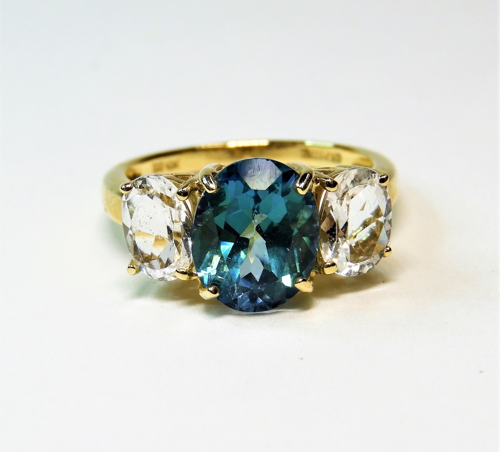 Appraisal: K YELLOW GOLD AQUA BLUE TOPAZ SPINEL RING China th