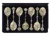 Appraisal: A VICTORIAN SILVER GILT FRUIT SERVICE of six ornate spoons