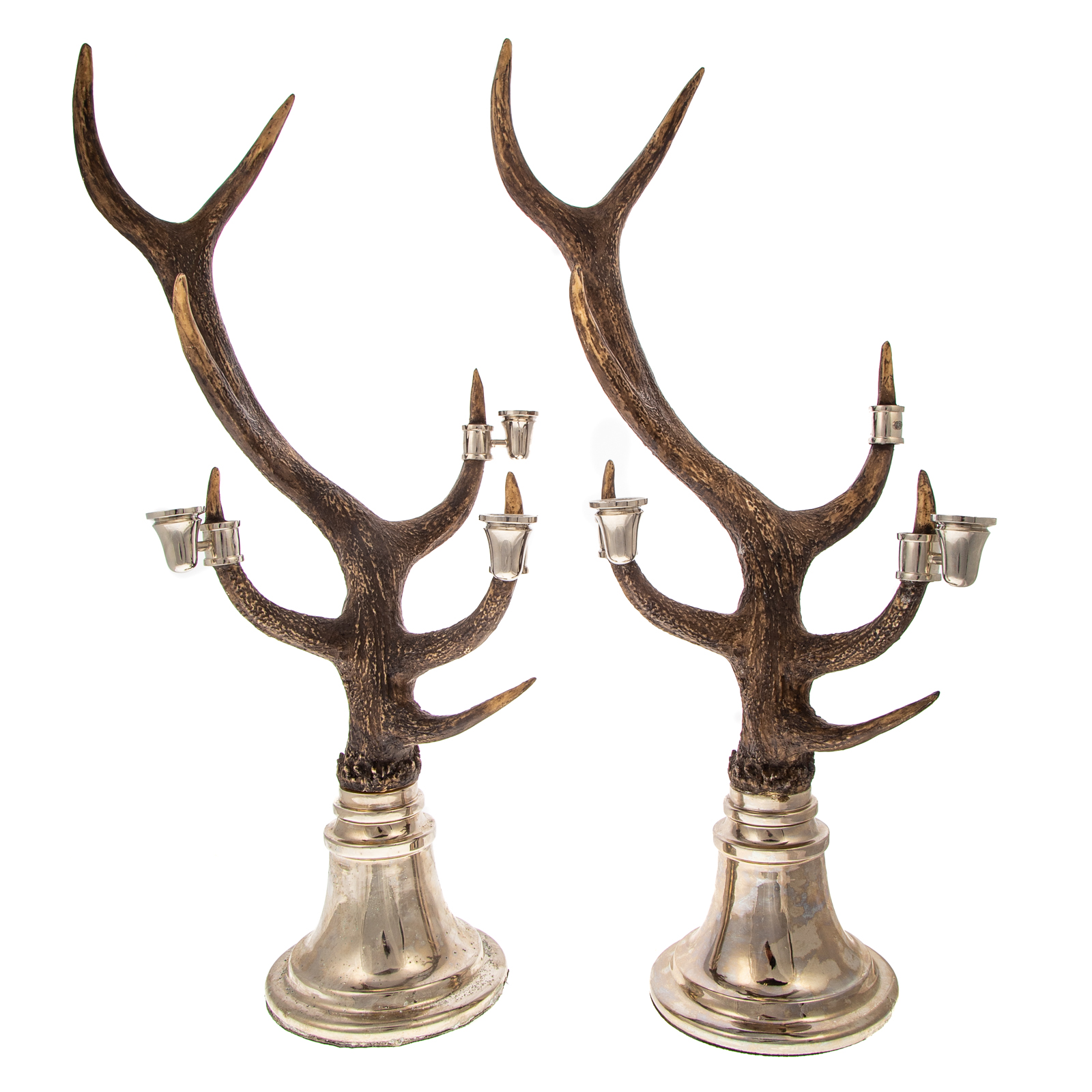 Appraisal: A PAIR OF RUSTIC STYLE ANTLER CANDELABRA Metal bell form