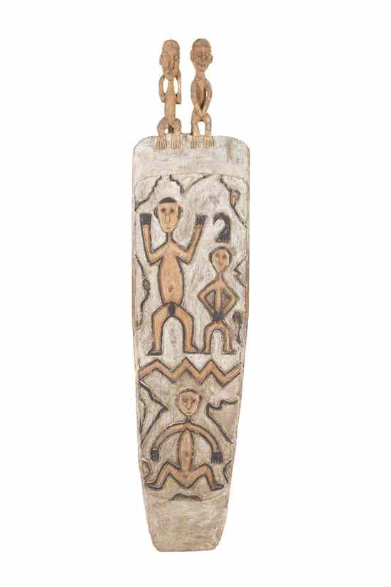 Appraisal: A New Guinea Style Carved and Polychrome Decorated Shield in