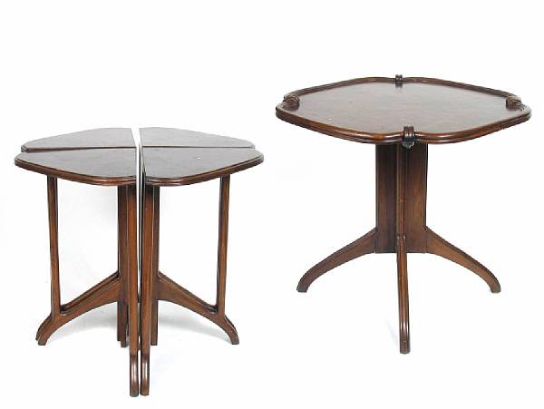 Appraisal: A set of five Art Nouveau style nested tables largest