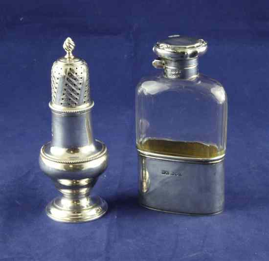 Appraisal: An Edwardian silver mounted panelled glass hip flask with hinged