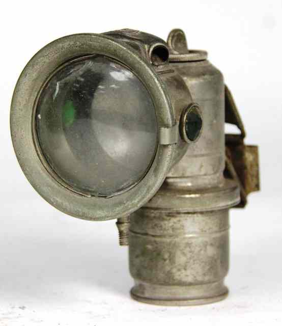 Appraisal: A Lucas Calcia-Cadet electroplate carbide motor lamp with green side