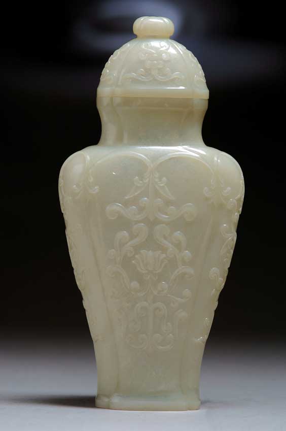 Appraisal: MOGHUL-STYLE JADE VASE Very thinly carved Chinese whitish celadon jade