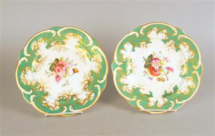 Appraisal: Pair of Rockingham porcelain plates With a scalloped rim decorated