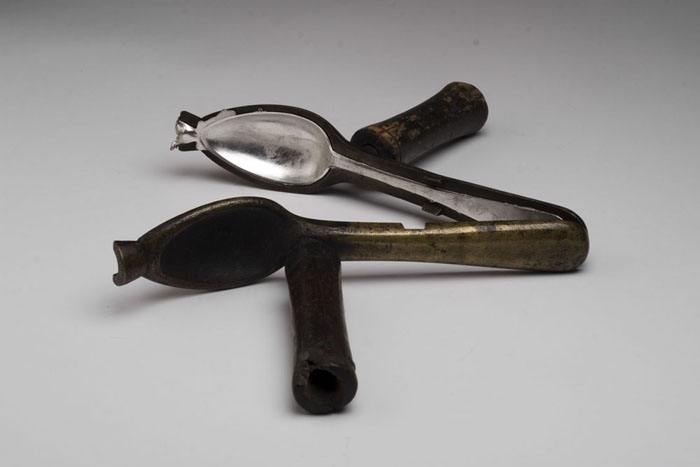 Appraisal: RARE BRASS TWO PART SPOON MOLD WITH ORIGINAL WOOD HANDLES