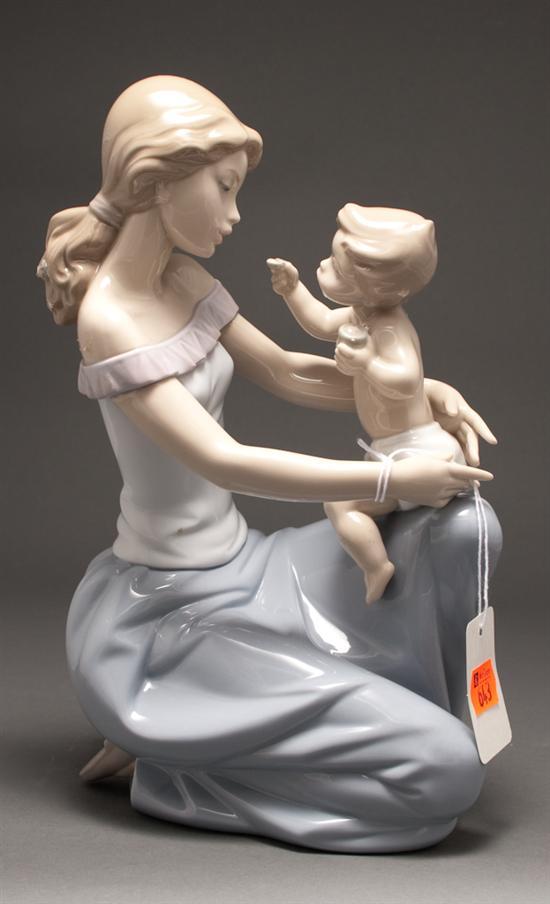 Appraisal: Lladro porcelain figural group of a mother and child blue