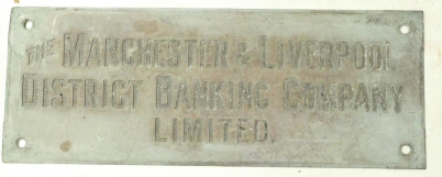 Appraisal: A brass name sign ''The Manchester Liverpool District Banking Company