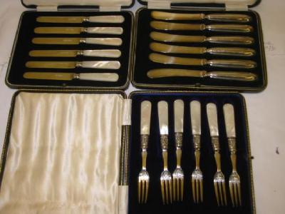 Appraisal: A SET OF SIX CAKE FORKS with leaf moulded ferrules