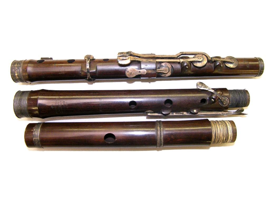 Appraisal: Early th century rosewood and silver mounted flute by and