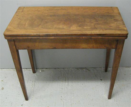 Appraisal: George III mahogany folding card table raised on square tapering