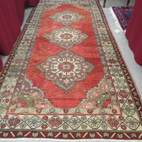 Appraisal: Oushak Persian Handmade Rug triple floral medallion floral borders salmon