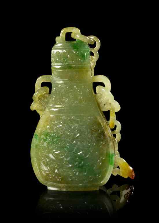 Appraisal: A Jade Lidded Vessel with Chain Links of a mottled