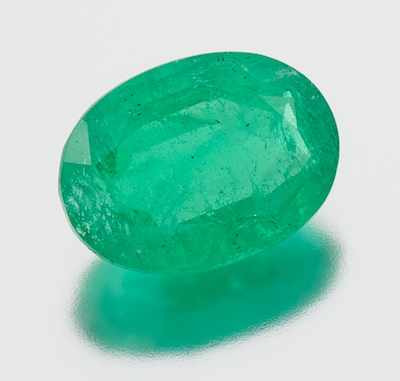 Appraisal: An Unmounted Emerald Oval faceted cut weighting carat Origin Brazil