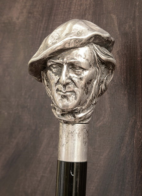 Appraisal: A WALKING CANE the silver finial cast in the form