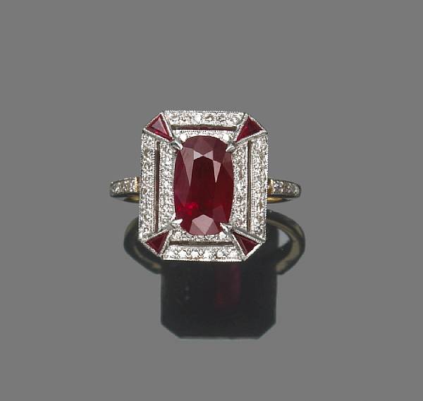 Appraisal: A ruby diamond and k bicolor gold ring ruby weighing