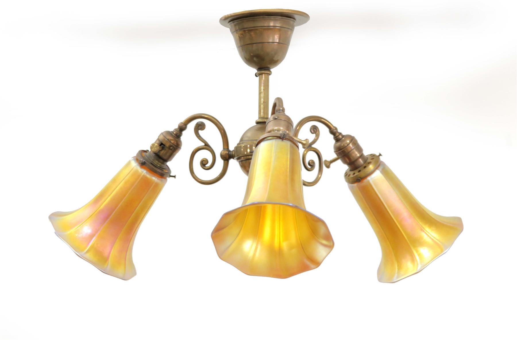 Appraisal: HANGING LAMP WITH THREE SIGNED STEUBEN AURENE SHADES American st