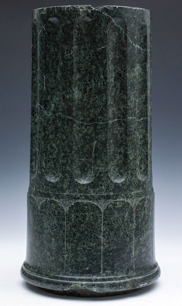 Appraisal: A FLUTED AND ENGRAVED GREEN MARBLE COLUMN FRAGMENT The green