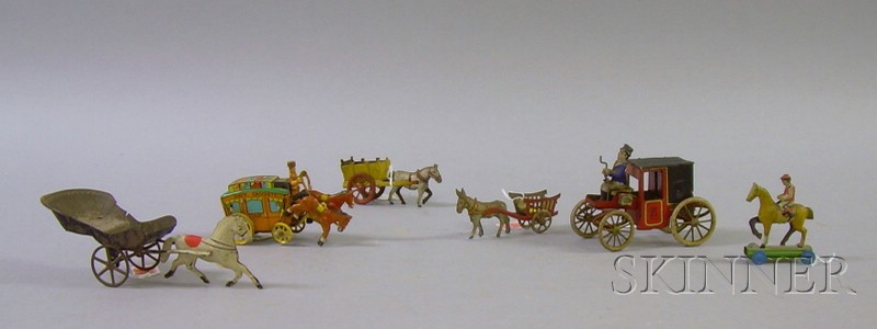 Appraisal: Six Small Lithographed Tin Horse Carriage and Rider Toys a