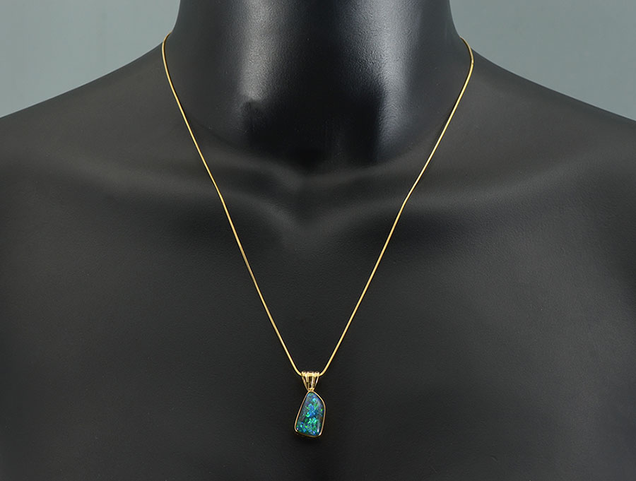 Appraisal: K OPAL PENDANT ON K CHAIN K yellow gold pendant