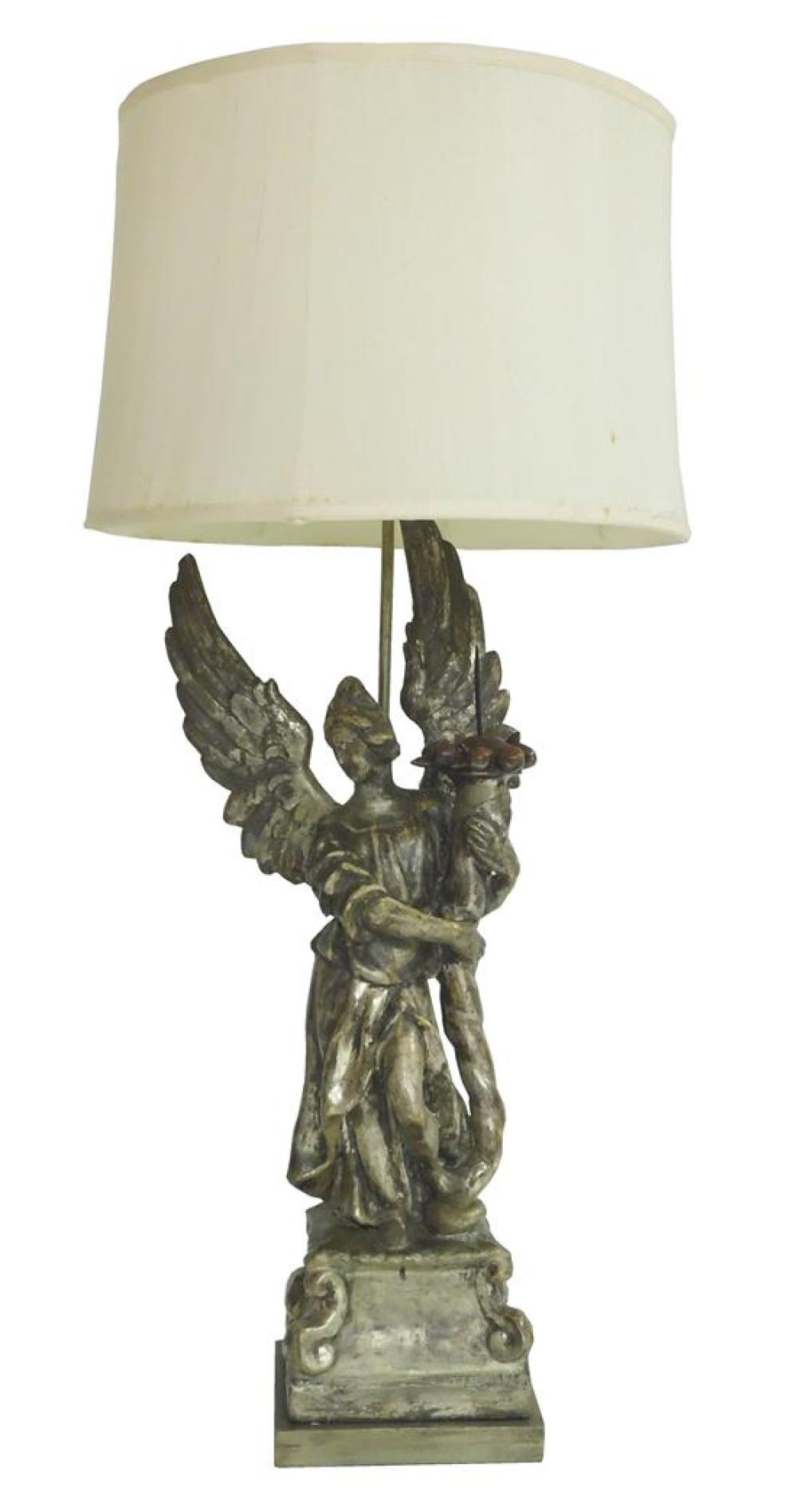 Appraisal: Lamp converted from pricket candle stick silver gilt angel holds