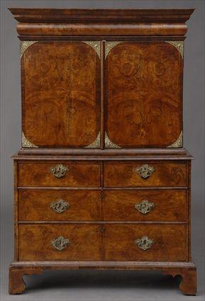 Appraisal: WILLIAM MARY WALNUT CABINET ON CHEST The molded cornice fitted