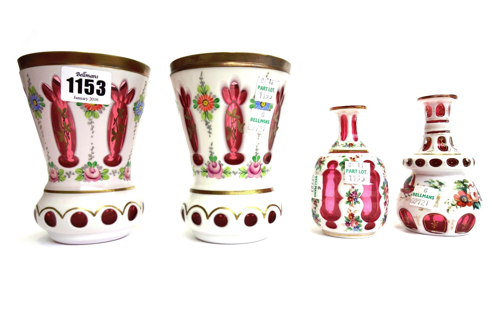 Appraisal: A pair of Continental cranberry and enamel overlaid glass vases